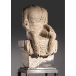 PREMIUM LOT - Full registration and deposit is needed. A Chinese grey limestone figure of a seated
