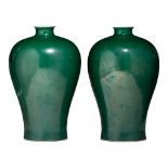 A pair of Chinese monochrome-green glazed meiping vases, with a Yongzheng mark, 20thC, H 38 cm