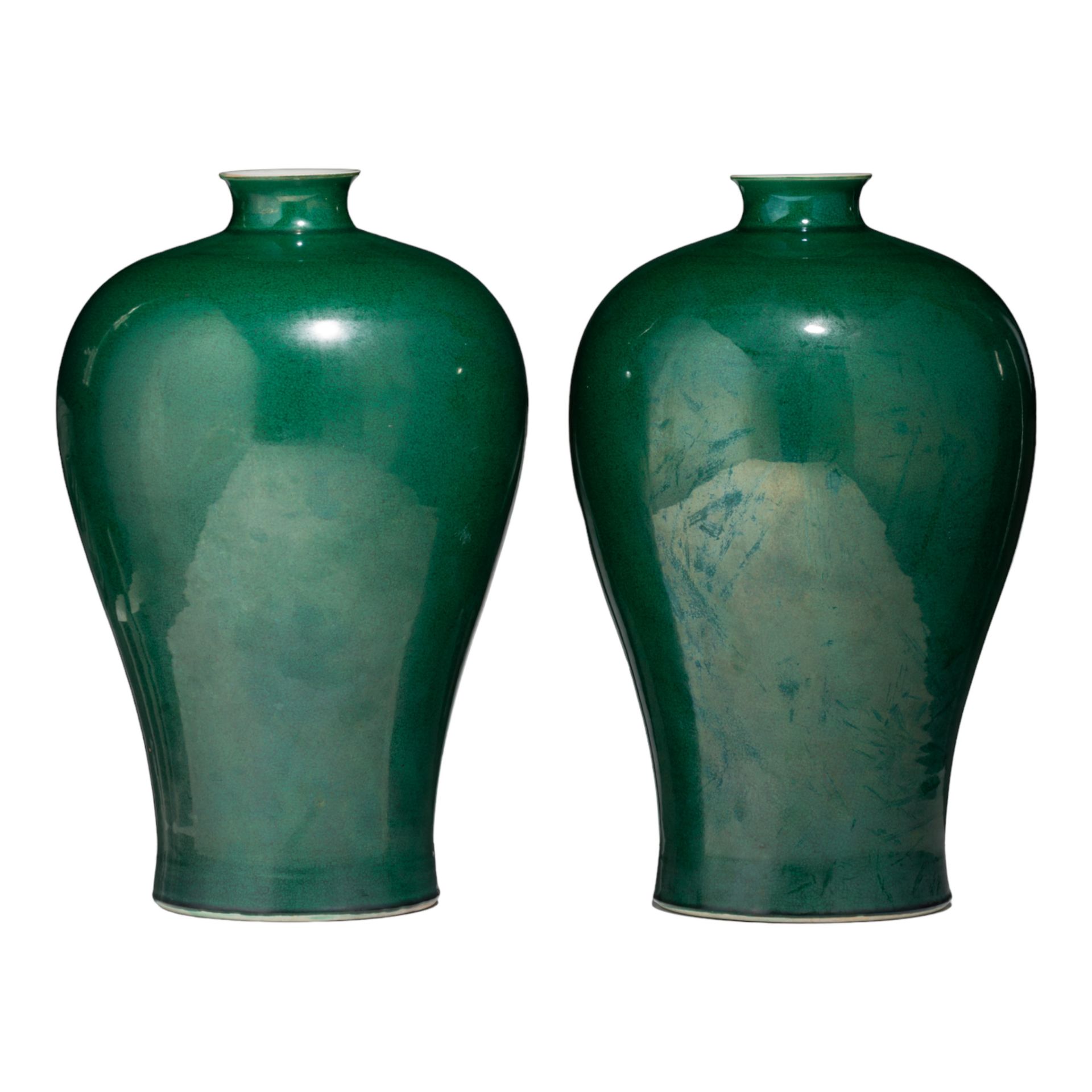 A pair of Chinese monochrome-green glazed meiping vases, with a Yongzheng mark, 20thC, H 38 cm