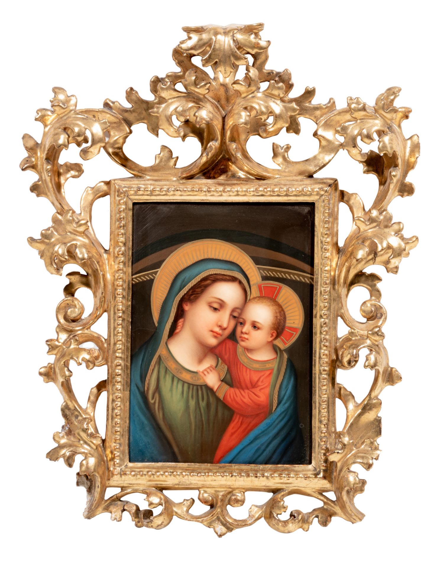 A finely painted KPM porcelain plaque of the Madonna and Child, in a richly decorated frame, late 19