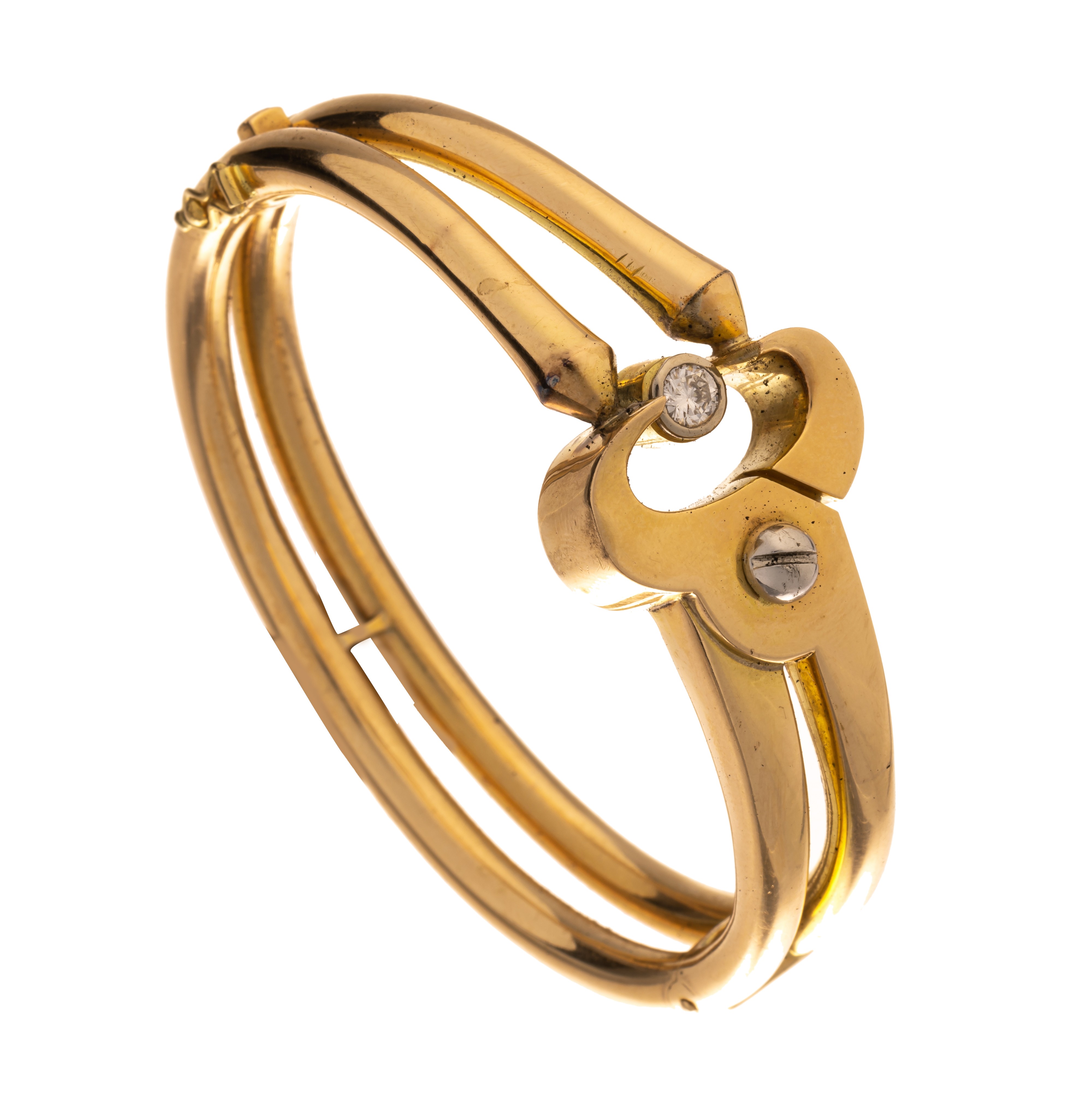 An 18ct yellow gold bracelet, set with a brilliant-cut diamond, 42,5 g