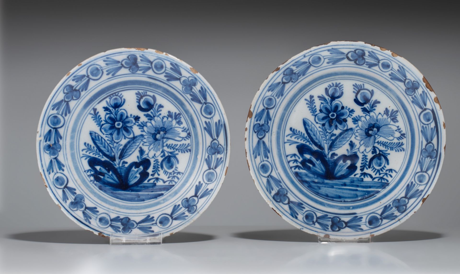 A pair of 18thC Delft plates by Geertruy Verstelle, added 12 blue and white plates, ø 16 - 34 cm - Image 12 of 17