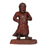 A rare Chinese lacquered wood figure of an Immortal holding a goose, Qing dynasty, H 42 cm