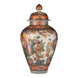 A Japanese Imari 'Ladies on a terrace' covered vase, Meiji period, H 78 cm