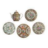 Four Chinese Canton famille rose plates and a teapot, 19thC, tallest H 18,5 cm