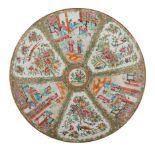 A Chinese Canton famille rose floral decorated charger, 19thC, ø 48 cm