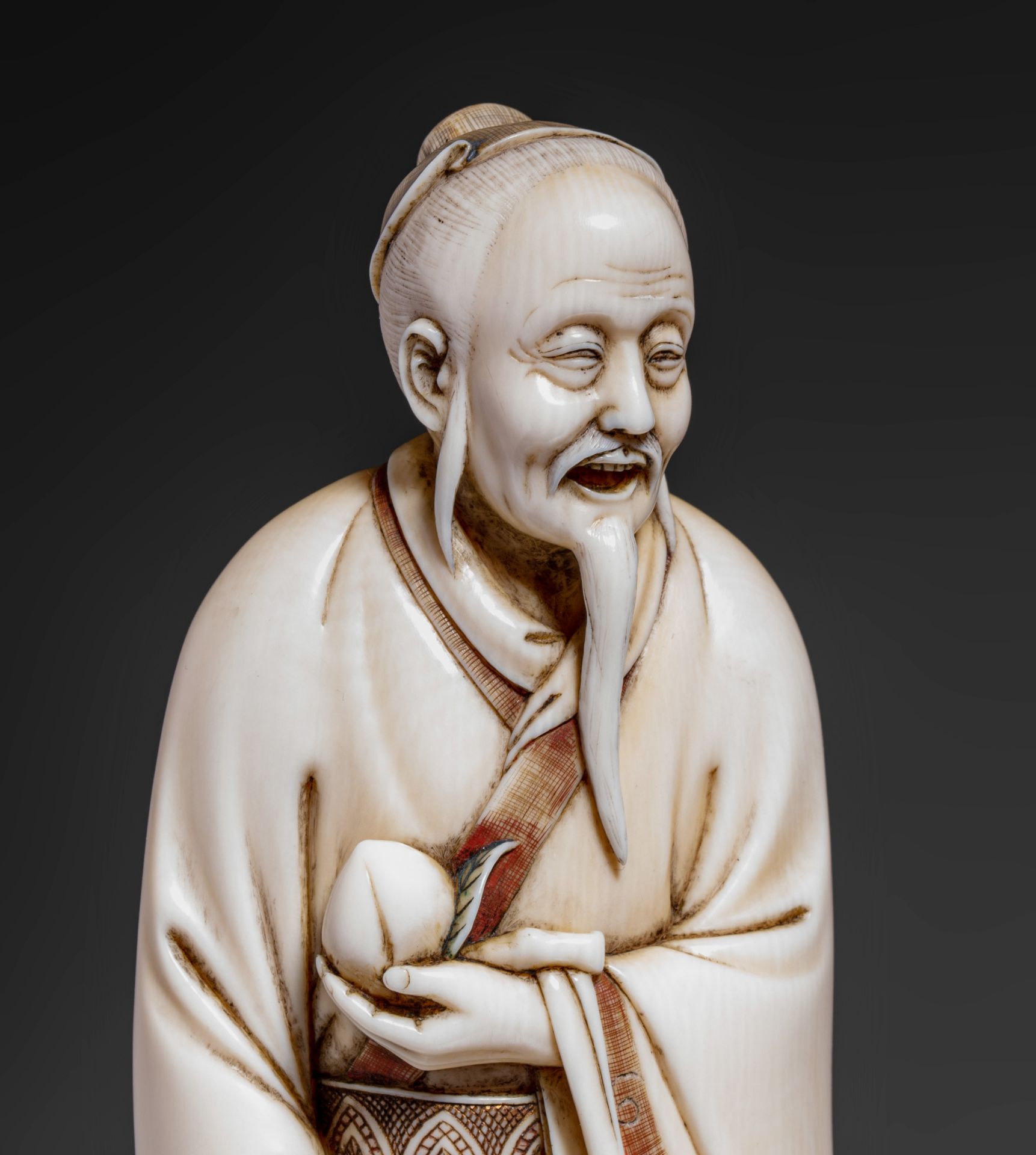 A Japanese ivory okimono of an Immortal, late Edo/early Meiji period, H 18,2 cm, 395 g (+) - Image 7 of 7