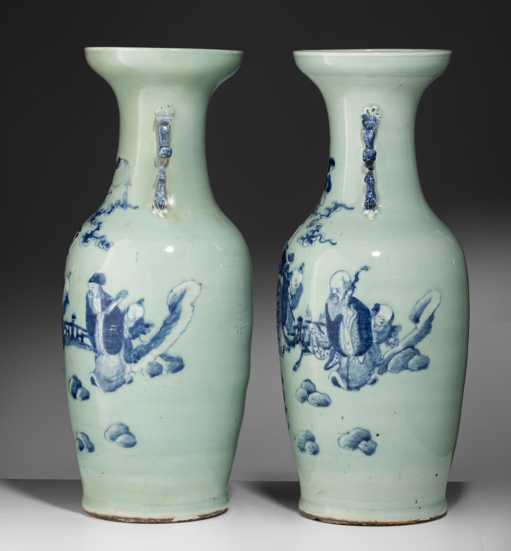A pair of Chinese blue and white on celadon ground 'Immortals' vases, 19thC, H 58 cm - Bild 3 aus 7