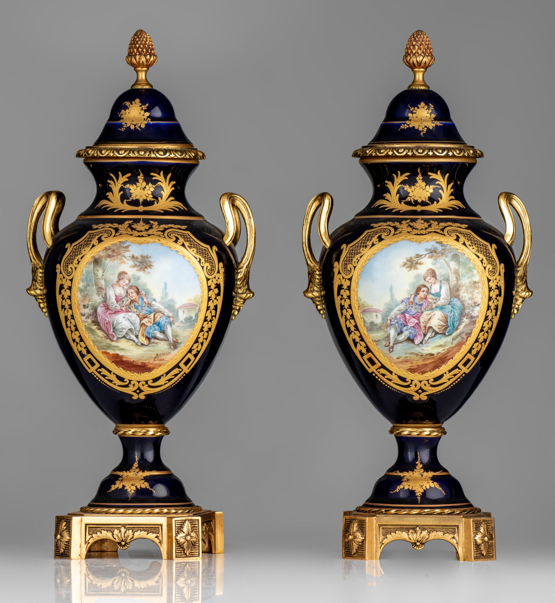 A three-piece Sèvres garniture set, decorated with gallant scenes, signed 'J. Césana', H 28,5 - 42,5 - Image 8 of 15