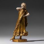 A chryselephantine sculpture of gilded bronze and ivory, 1910-1930, H 29 cm (+)