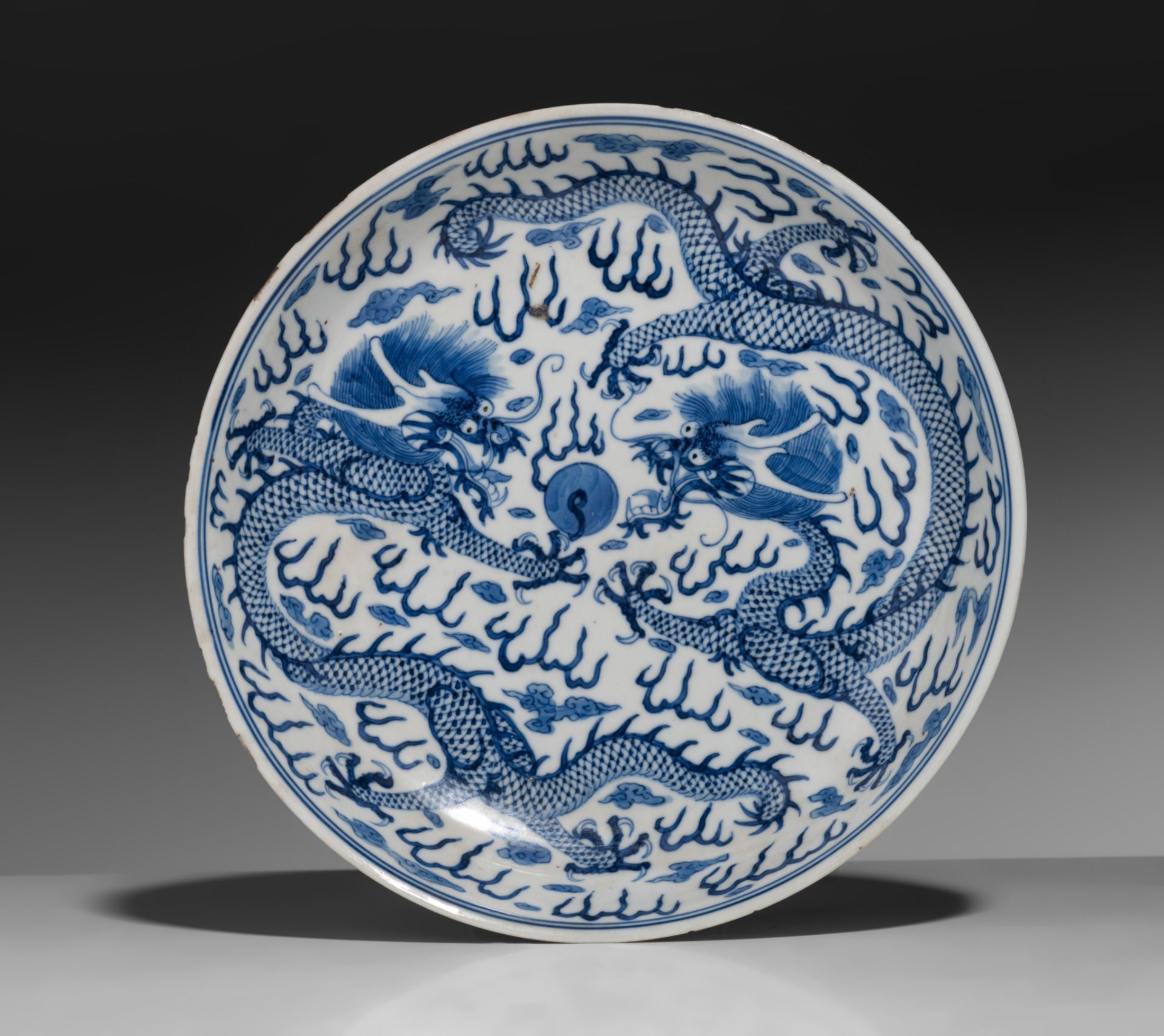 A Chinese blue and white 'Dragons' dish, Jiangxi Porcelain Company (Jiangxi Ciye Gongsi) mark, Repub - Image 2 of 3
