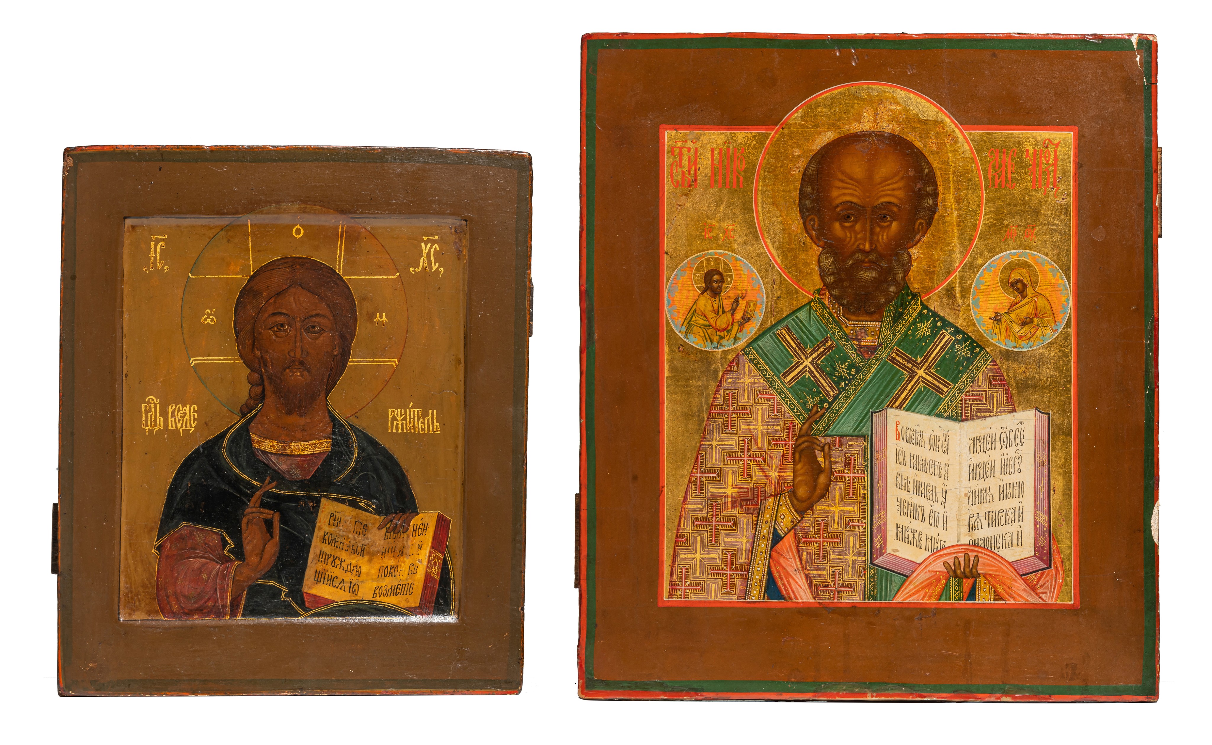 Two Russian icons depicting Christ Pantocrator and Saint Nicholas, early 19thC, 25 x 29 - 31 x 36 cm