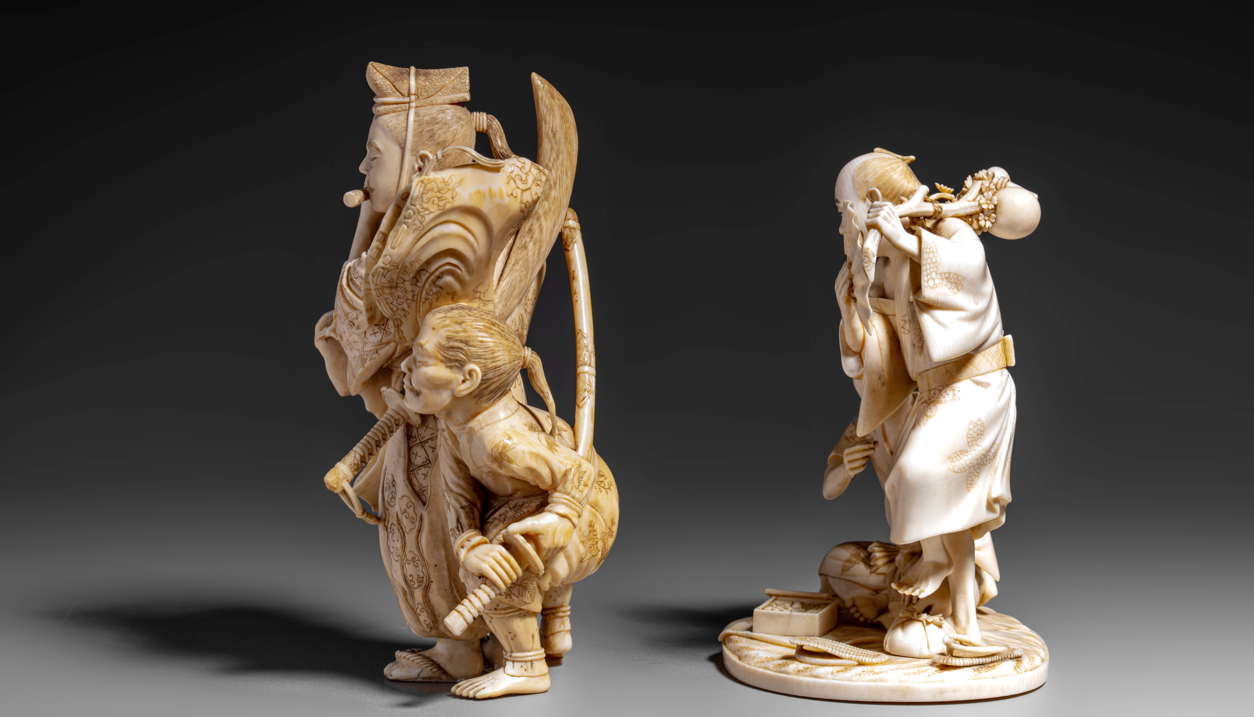 Two Japanese ivory okimono of a group of figures, H 11,2 cm - 13,3 cm, 195 - 233 g (+) - Image 2 of 7