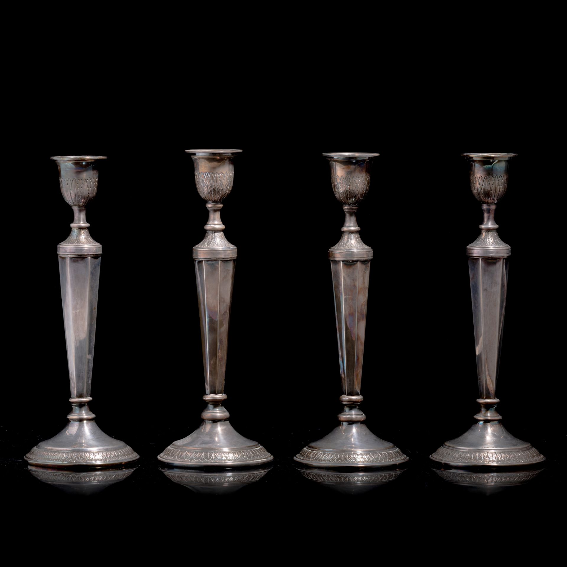 A set of four Neoclassical silver candlesticks by Albert Charlent, Brussels, 20thC, 835/000 H 32,5 -