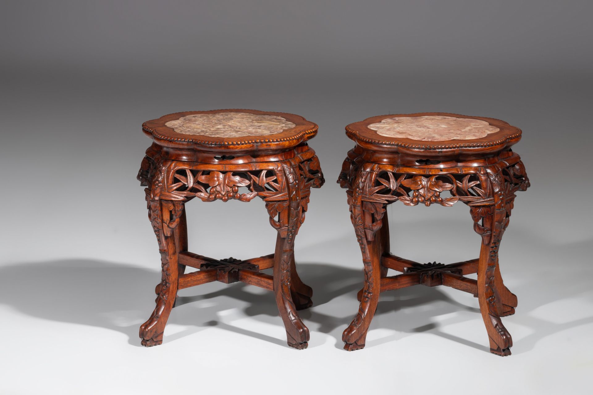 A collection of four carved low hardwood stands, with marble tops, late Qing, tallest H 61,5 cm (4) - Image 11 of 13