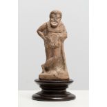 An antique terracotta figurine of a comic actor, Greece, ca. 350 B.C., H 15,2 cm