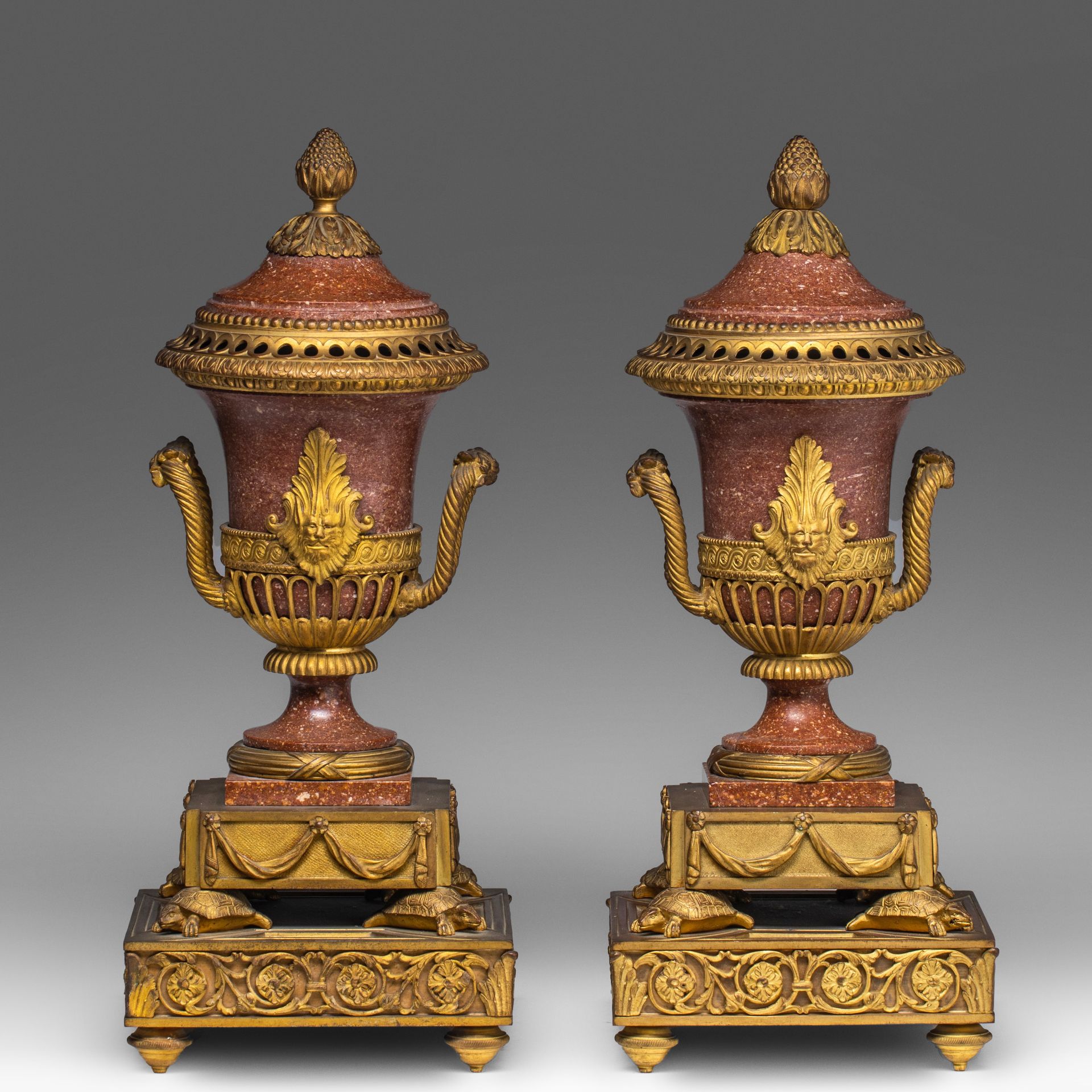 A pair of Neoclassical gilt bronze-mounted porphyry cassolettes, 19thC, H 35 cm