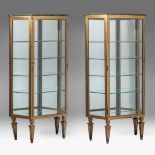 A pair of Neoclassical gilt bronze display cabinets with marble tops, H 148 - W 75 - D 35 cm