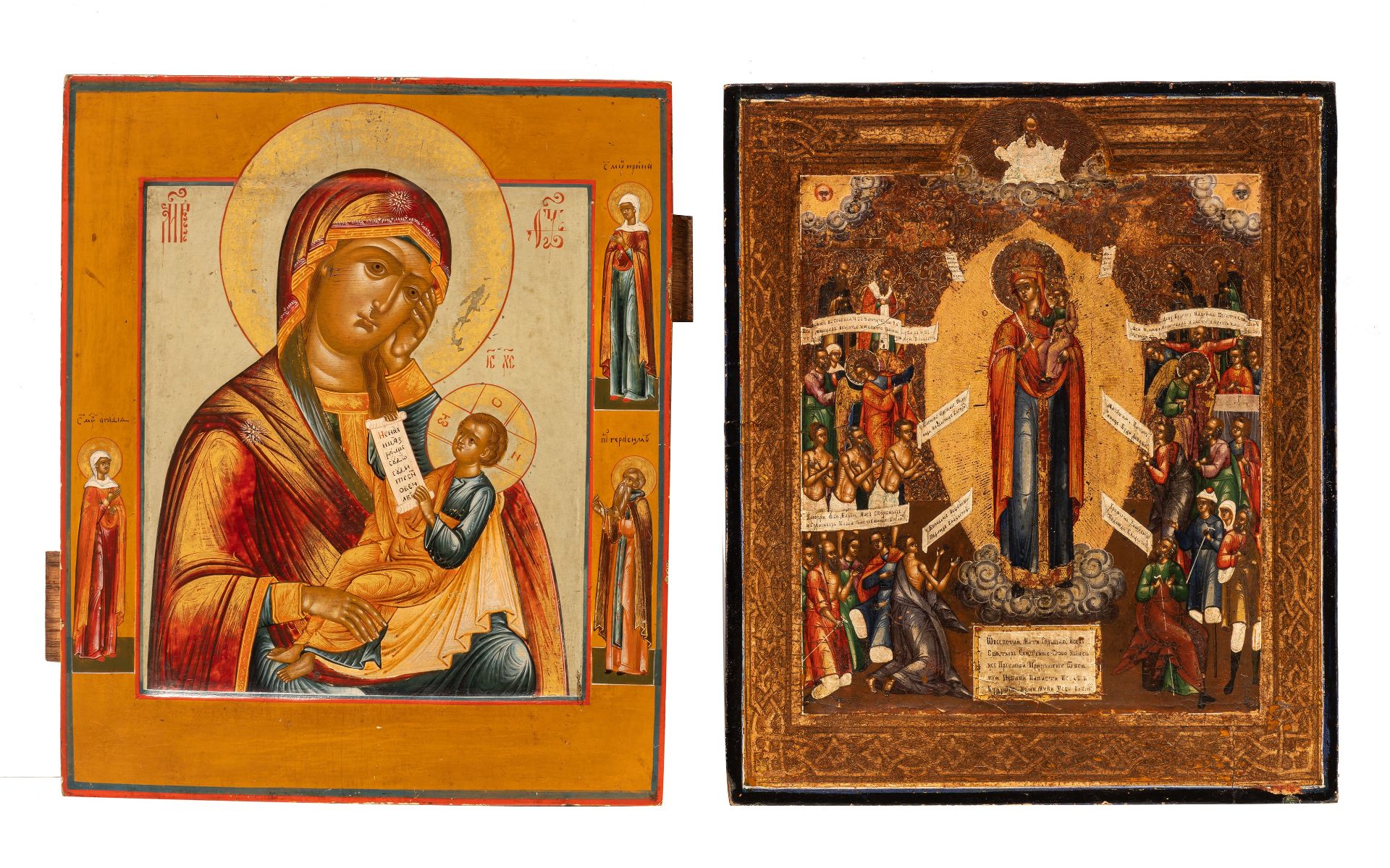 Two 19thC Russian icons, 'Virgin and Child Hodegetria' and 'Joy to all who Grieve', 31 x 26 cm