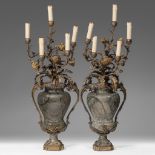 A pair of Rococo style marble and gilt bronze girandoles, 19thC, H 100 cm