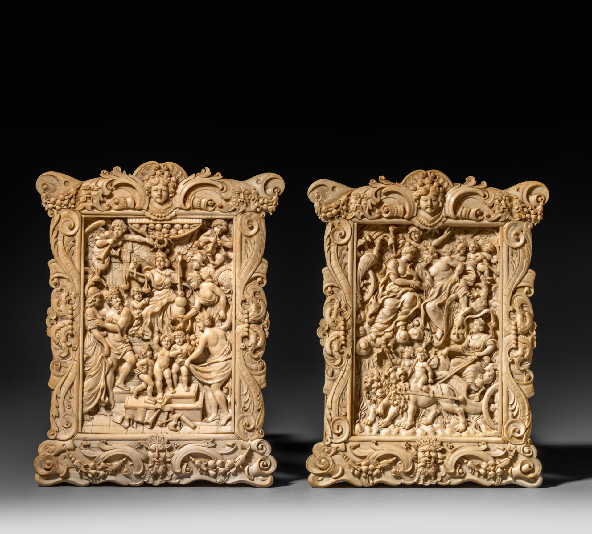 A pair of plaques carved in high relief, second half 19thC, 18 × 24,4 cm, 429 g - 490 g (+)