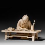 A Japanese ivory okimono of an artist contemplating his work, Meiji period, H 7,6 cm, 285 g (+)