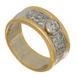 An 18ct yellow gold ring, set with a central brilliant-cut diamond, and 24 smaller brilliant cut dia