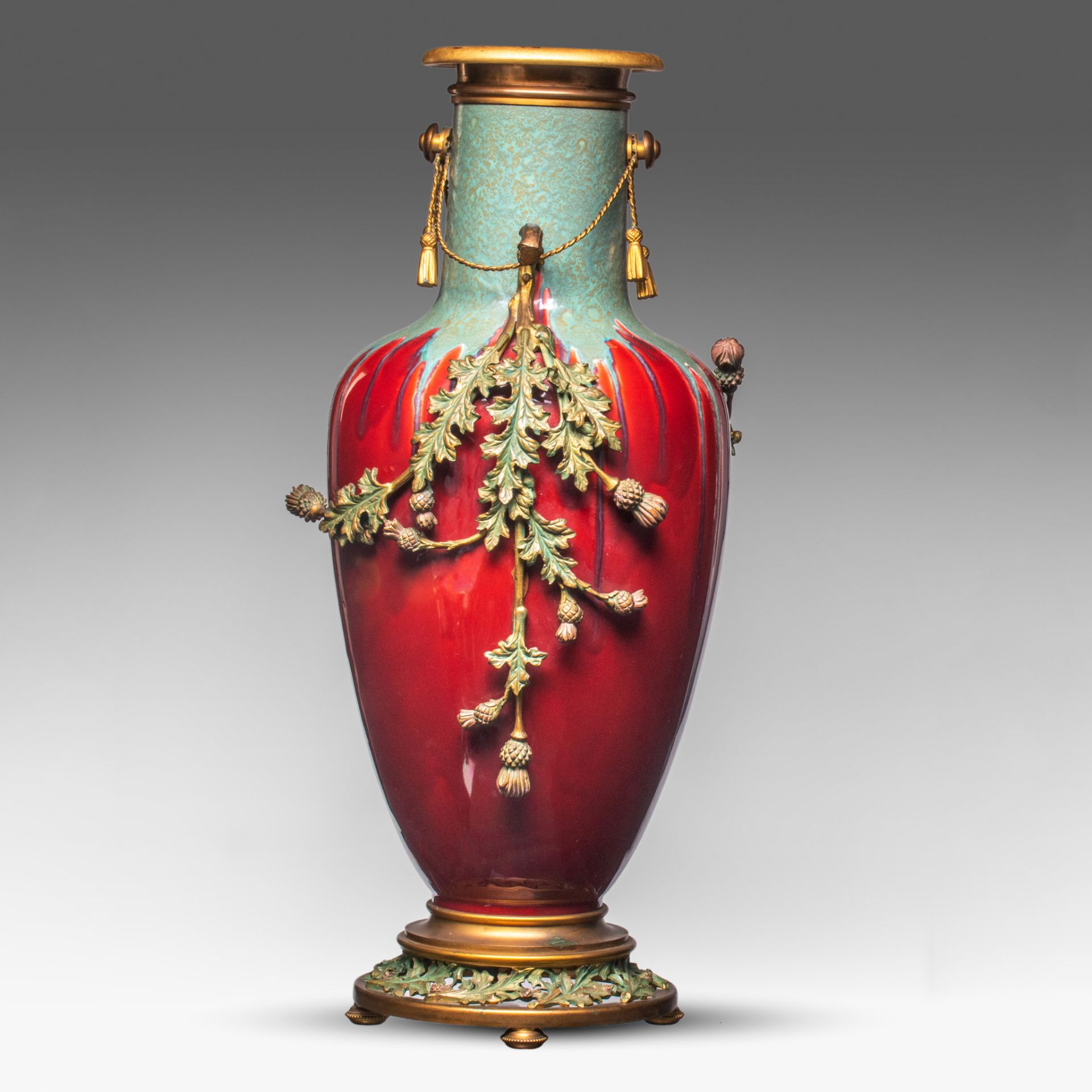A Jugendstil flambe vase with floral gilt brass mounts, H 60 cm