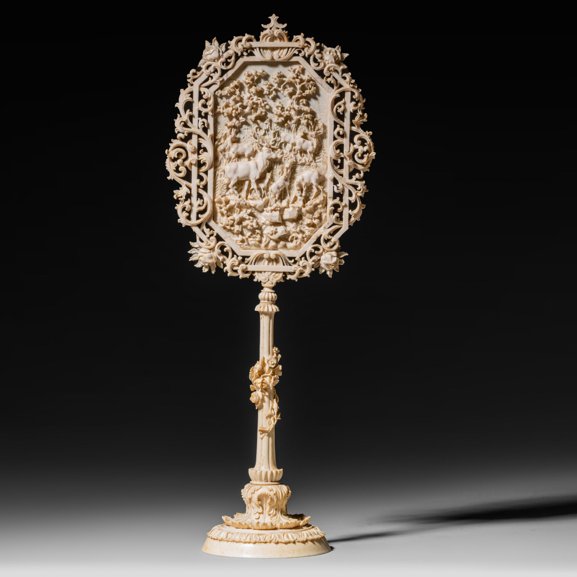 A 19thC, probably German, richly carved ivory candle screen, H 43,5 cm - 491 g (+)