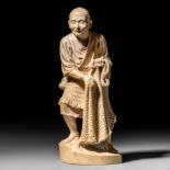 A Japanese Meiji period ivory okimono of an elderly fisherman, H 31 cm - 2355 g (+)