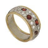 An 18ct yellow gold ring, set with 31 brilliant-cut diamonds and 5 garnets, signed by the designer,