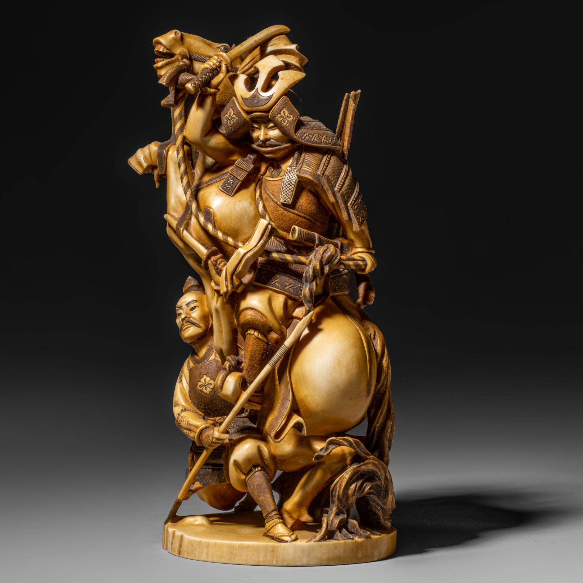 A Japanese ivory okimono of a mounted samurai, Meiji/Taisho period, H 26,2 cm - 1771 g (+)