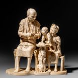 A Japanese ivory okimono of a family scene, signed Koshin, Meiji period, W 25,7 cm - H 27,2 cm - 266