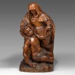 A 17thC Flemish limewood Pieta, H 83 cm