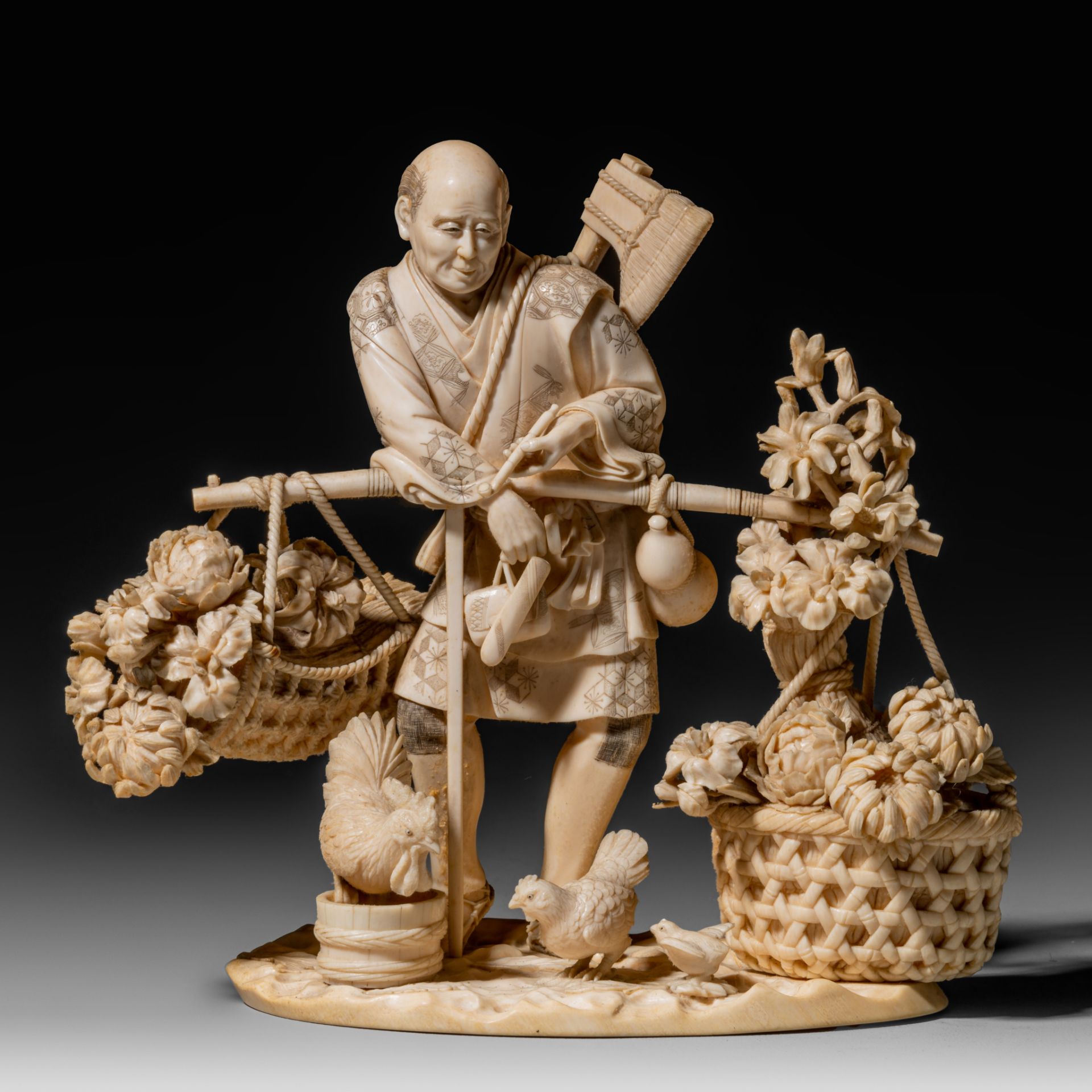 A Japanese Meiji period ivory okimono depicting a florist taking a rest, H 17,4 cm - 724 g (+)