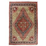 An Oriental carpet, 249 cm x 390 cm