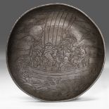 A large Japanese pewter plate, carved with the Eight Immortals in a boat, dia 60 cm