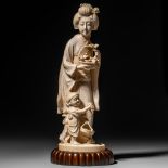 A Japanese Meiji period ivory okimono representing a mother and child, H 37,7 cm - 2483 g (+)