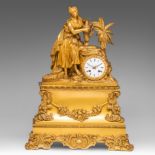 A Louis-Philippe gilt bronze mantle clock with on top an Oriental woman holding a water jug, mid 19t