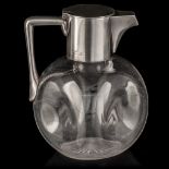 A glass claret jug with a silver mount, hallmarked London, year letter b (1897), maker's mark WCJL,