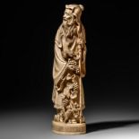 An ivory figure representing an immortal with monkeys and grapes, 19thC, H 51 cm - 6400 g (+)