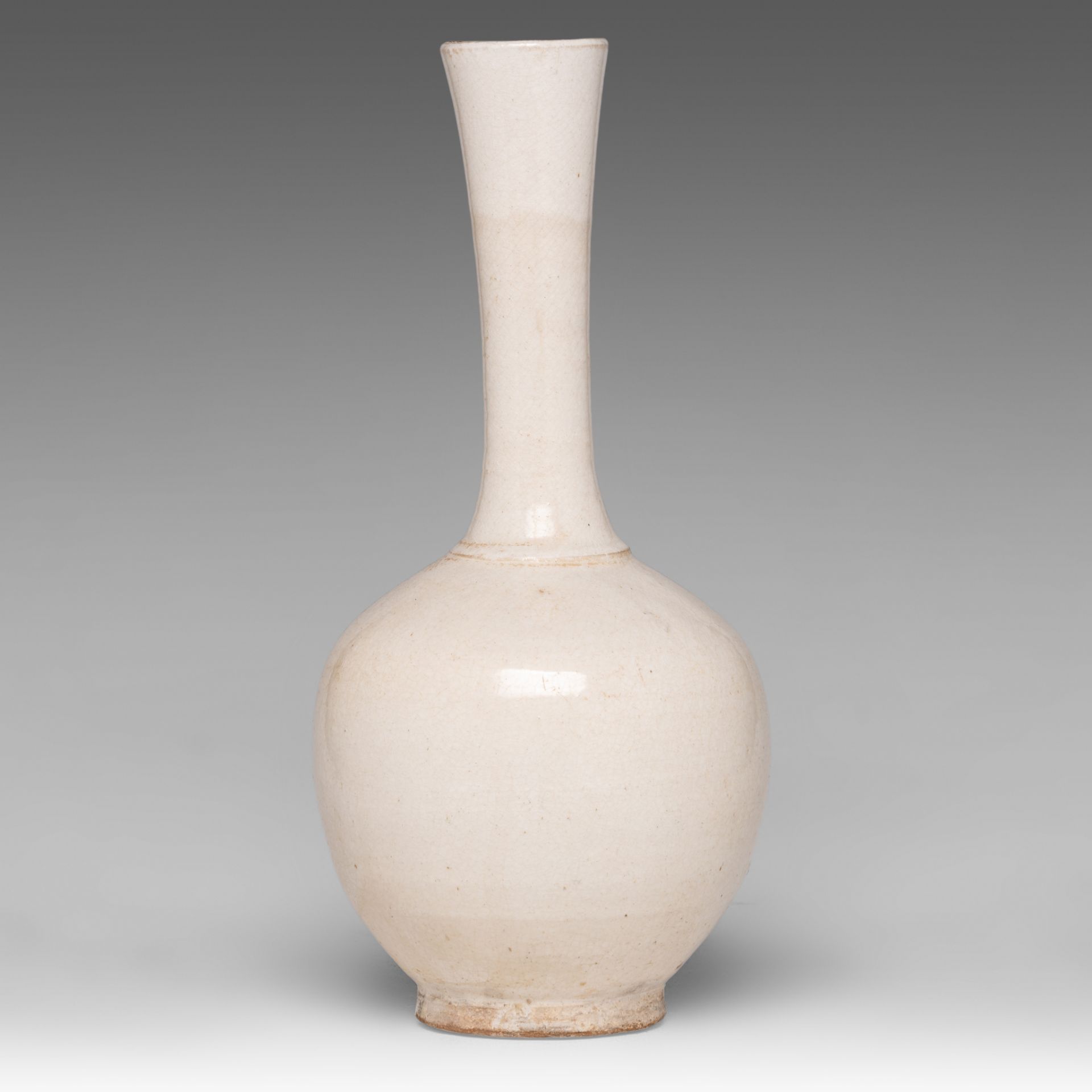 A Chinese cream-glazed bottle vase, Song-Ming dynasty, H 31 cm - Image 4 of 6