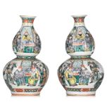 A pair of Chines famille verte double-gourd 'The Romance of the Three Kingdoms' vases, 19thC, H 36 c