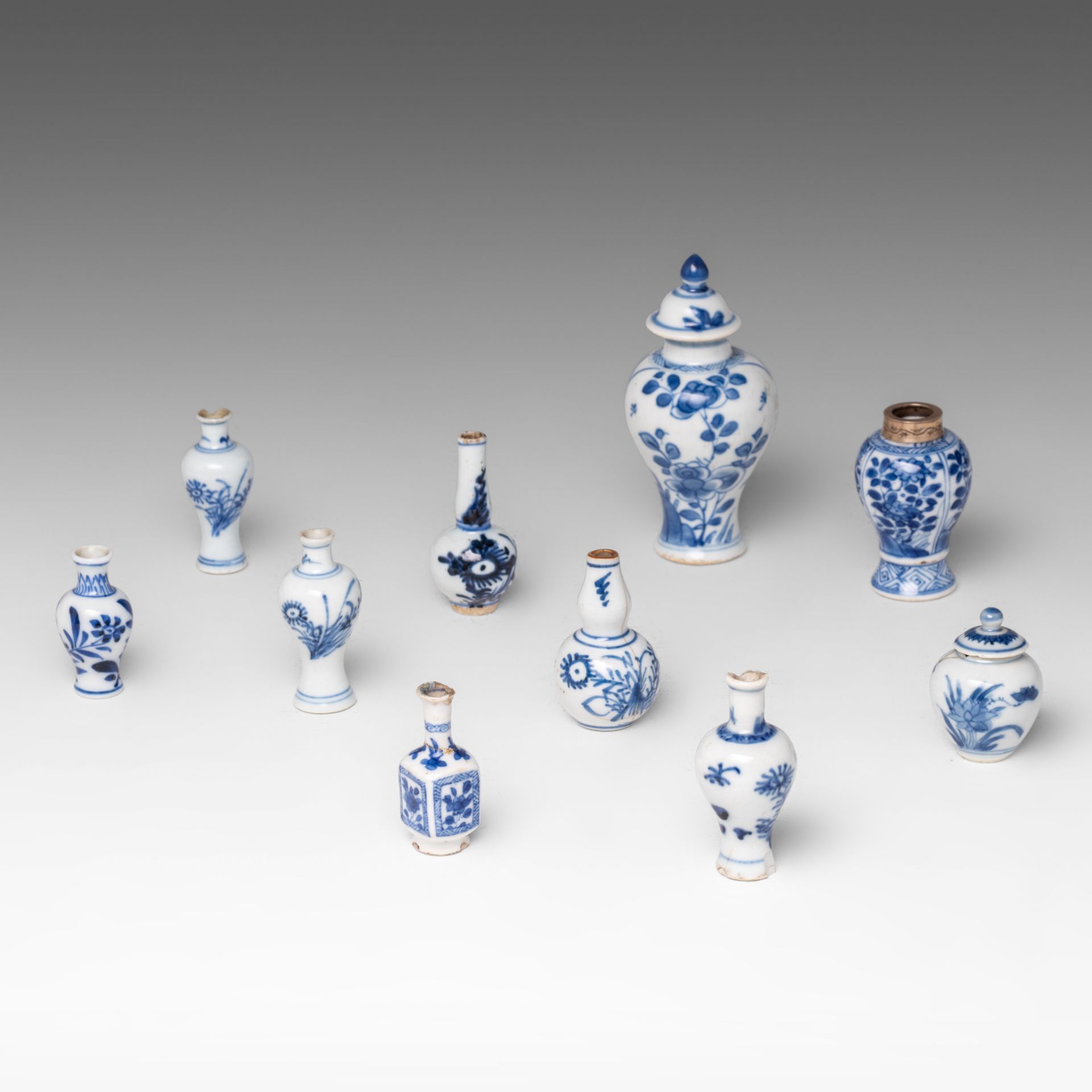 A collection of ten Chinese miniature vases, some Kangxi and some Qianlong period, tallest H 11 cm (