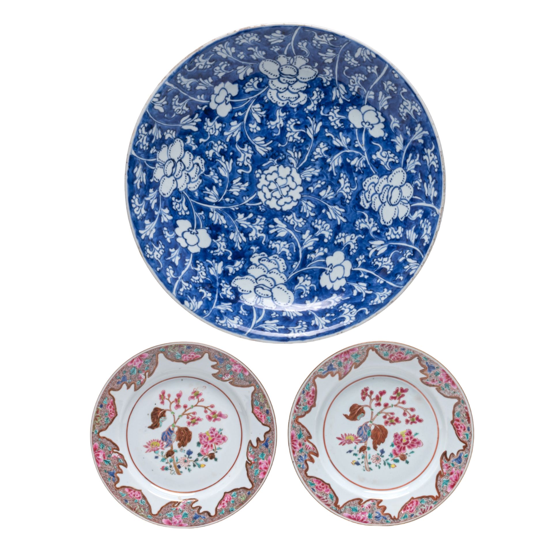 A Chinese blue and white reverse decorated 'Peony pattern' charger, Kangxi period, dia 39 cm - added