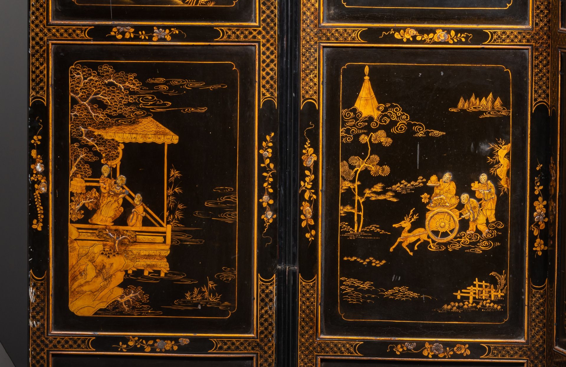 A Chinese gilt and black lacquered four-panel chamber screen, late 18thC, 60 x 198 cm (each panel) - Image 4 of 5