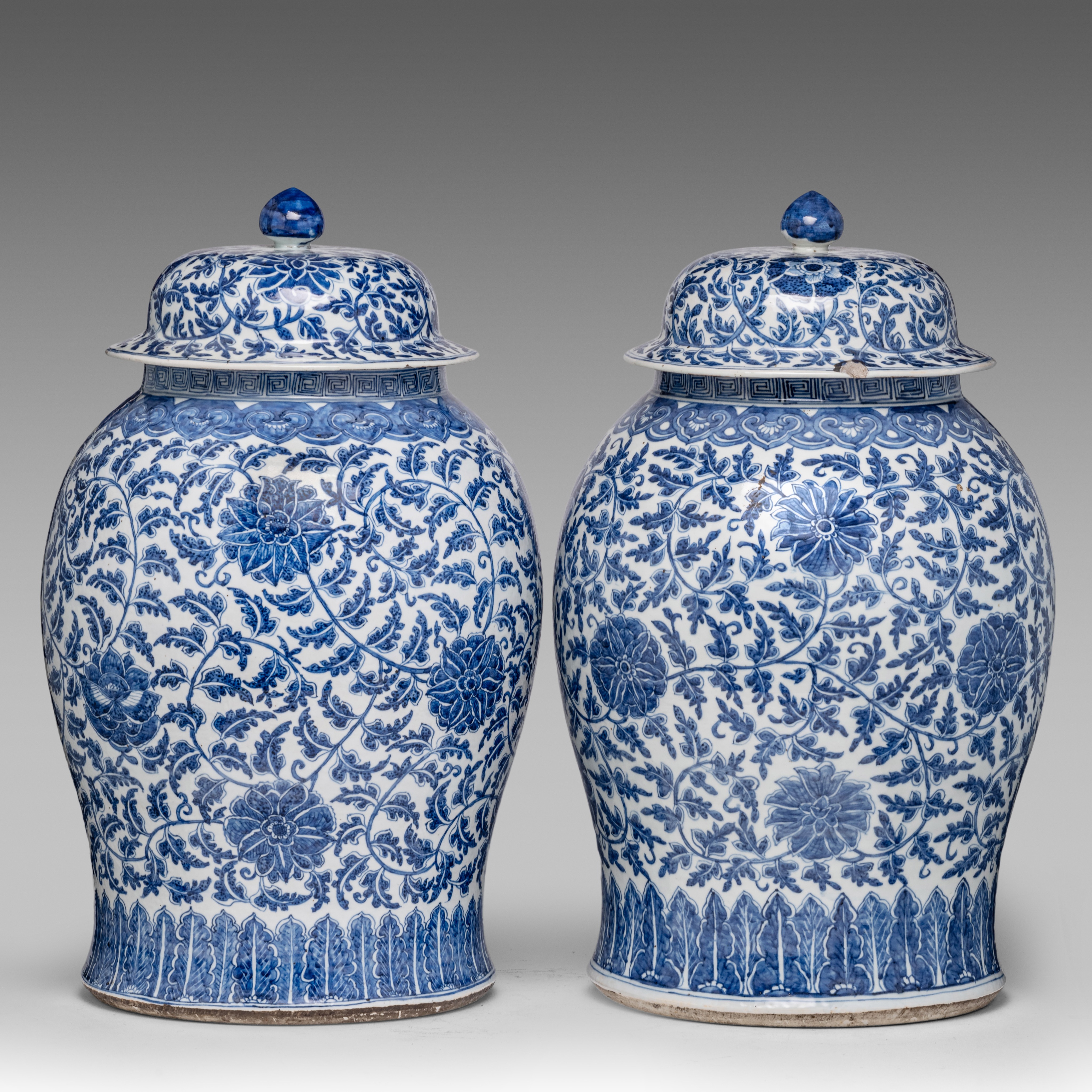 A pair of Chinese blue and white 'Scrolling Lotus' baluster vases and covers, 19thC, H 61,5 cm - Image 2 of 8