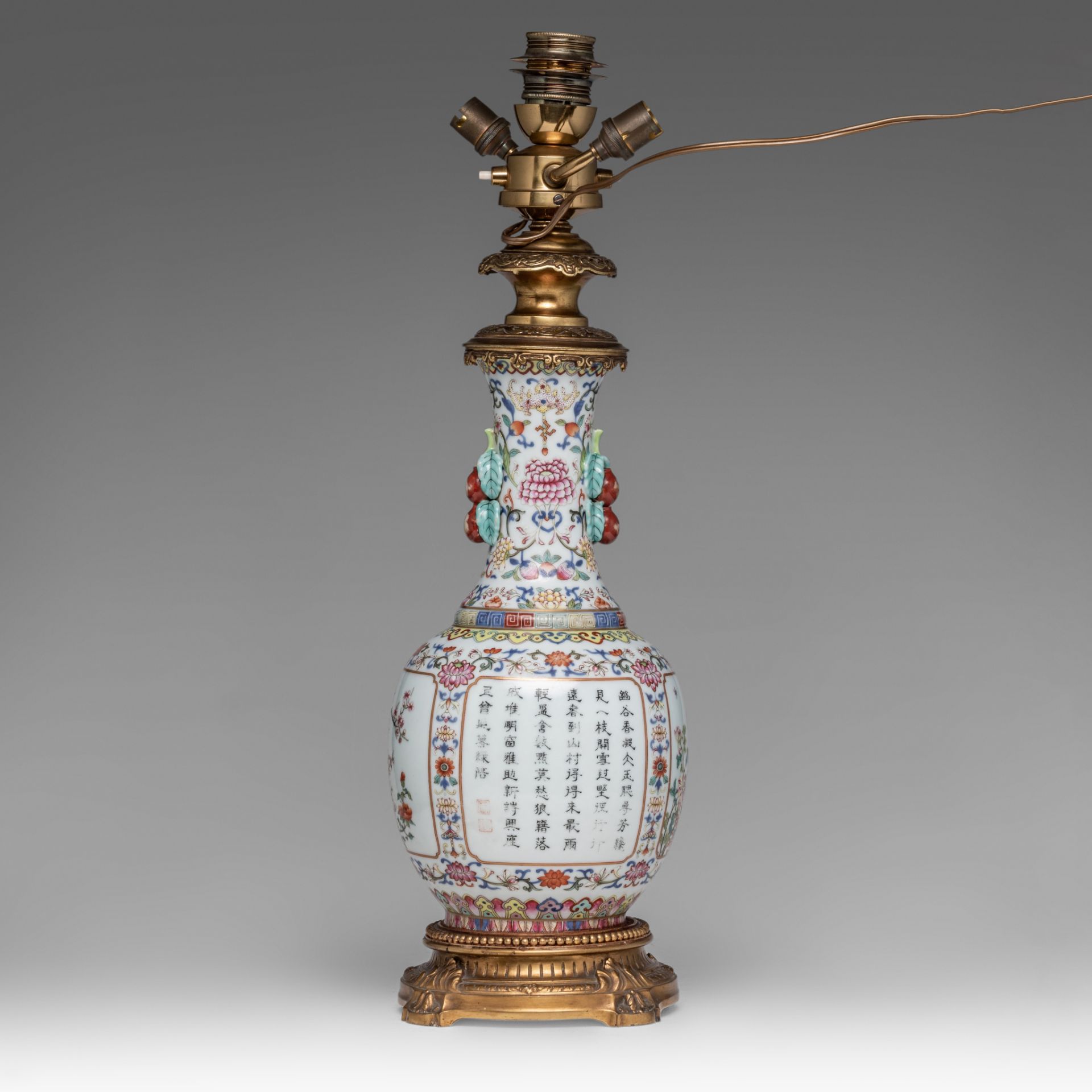 A Chinese famille rose floral decorated bottle vase, fixed with lamp mounts, with a Qianlong mark, T - Image 3 of 5