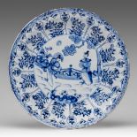 A Chinese blue and white plate, Kangxi period, dia 27,5 cm