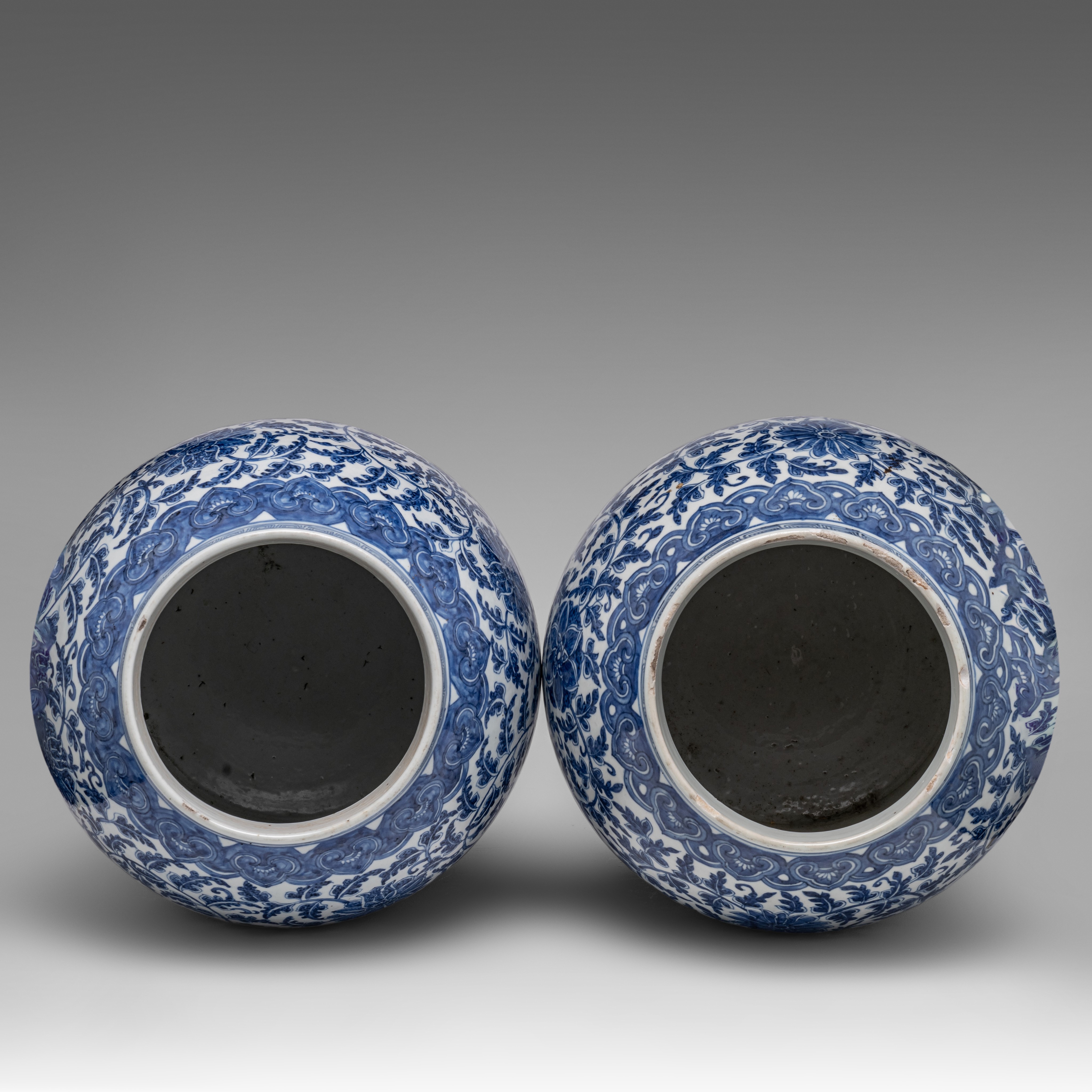 A pair of Chinese blue and white 'Scrolling Lotus' baluster vases and covers, 19thC, H 61,5 cm - Image 5 of 8